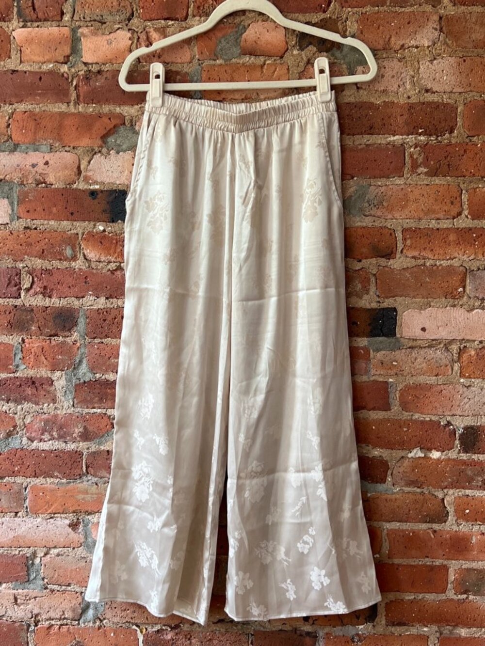 NLT Cream satin pants with subtle floral print